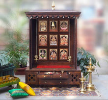 Load image into Gallery viewer, Solid Wood Handcrafted Pooja Mandir with Shutters Accessorised with Antique Decorative Brass Bells and Finished in Walnut PU with Legs (TLWL4267)