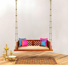 Load image into Gallery viewer, Solid Wood Handcrafted Indian Traditional Swing/Jhoola with Carved Back and Armrest &amp; Finished with Cherry Brown PU and Antiques Brass Links front view