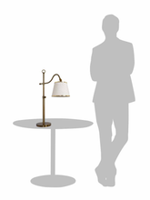 Load image into Gallery viewer, Table Light With White Textured Gold Rim Fabric Shade comparison with human