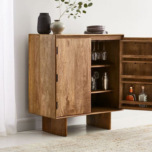 Natural finish bar cabinet with bottle space in doors