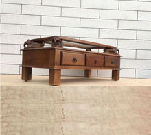Load image into Gallery viewer, Asgil coffee table with assorted hand carving elephants with 3 drawers. side view