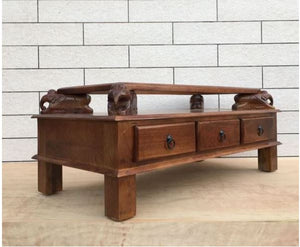 Asgil coffee table with assorted hand carving elephants with 3 drawers. closed drawers