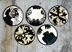 Exquisitely hand painted Set of 5 'Panic' wall plates.
