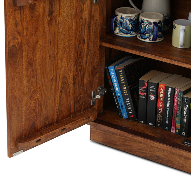 Acacia wood handcrafted sideboard close up of the shelf