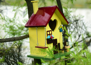 Beautifully Designed Yellow Birdhouse with swing