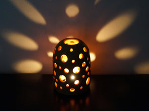 Cheese Hole Lamp with candle inside